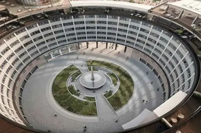 High-angle view of the circular TVC Tower, showing its architecture and central courtyard.